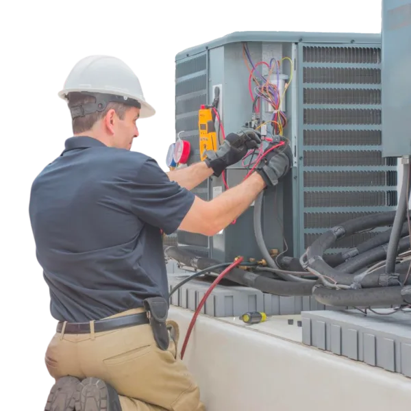 HVAC technician using a multimeter