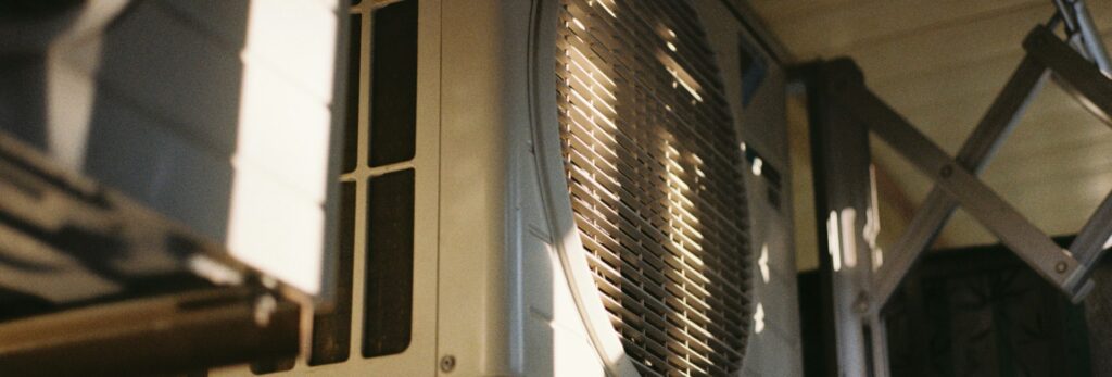 Close-up of an outdoor air conditioning condenser unit